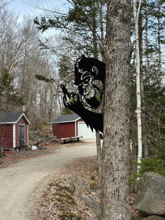 Metal bigfoot (Sasquatch) flipping the bird